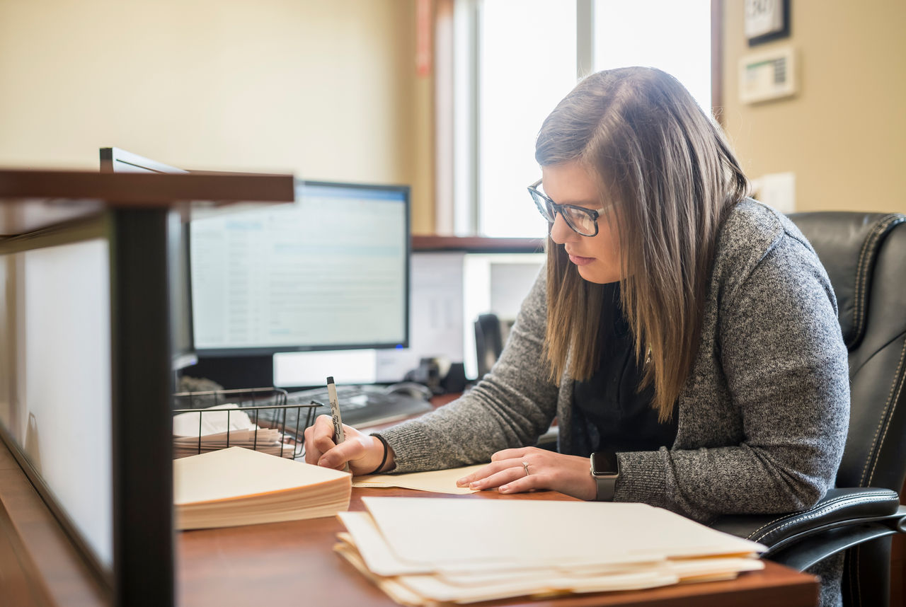 Farmer Reviewing documents